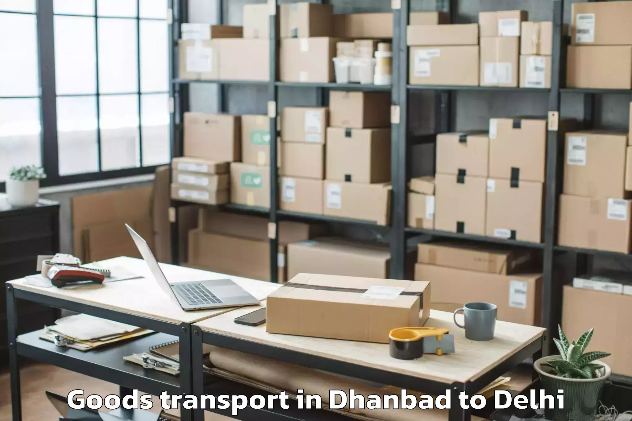 Easy Dhanbad to Unity One Mall Cbd Shahdara Goods Transport Booking